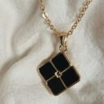 "قلادة سوداء ماركة XP من الفولاذ المقاوم للصدأ - نيو بيجو"